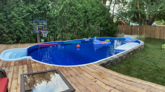 On - Ground pool installation, completed and landscaped.