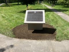 Large plaque we installed footing and base.